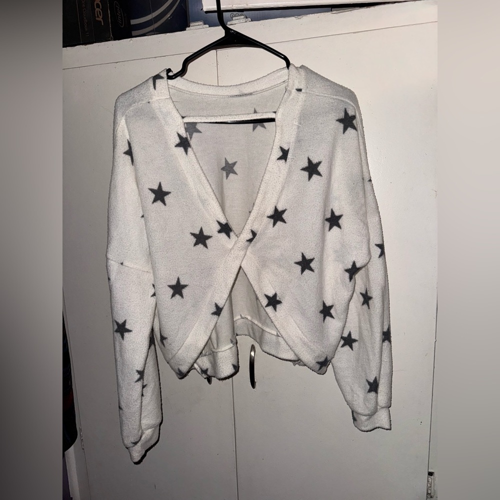 Women’s star themed sweater top  (semi fuzzy material)